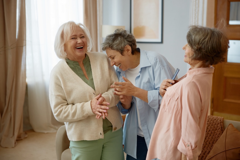 Group of senior women laughing and having fun at their Retirement Communities Fresno ca